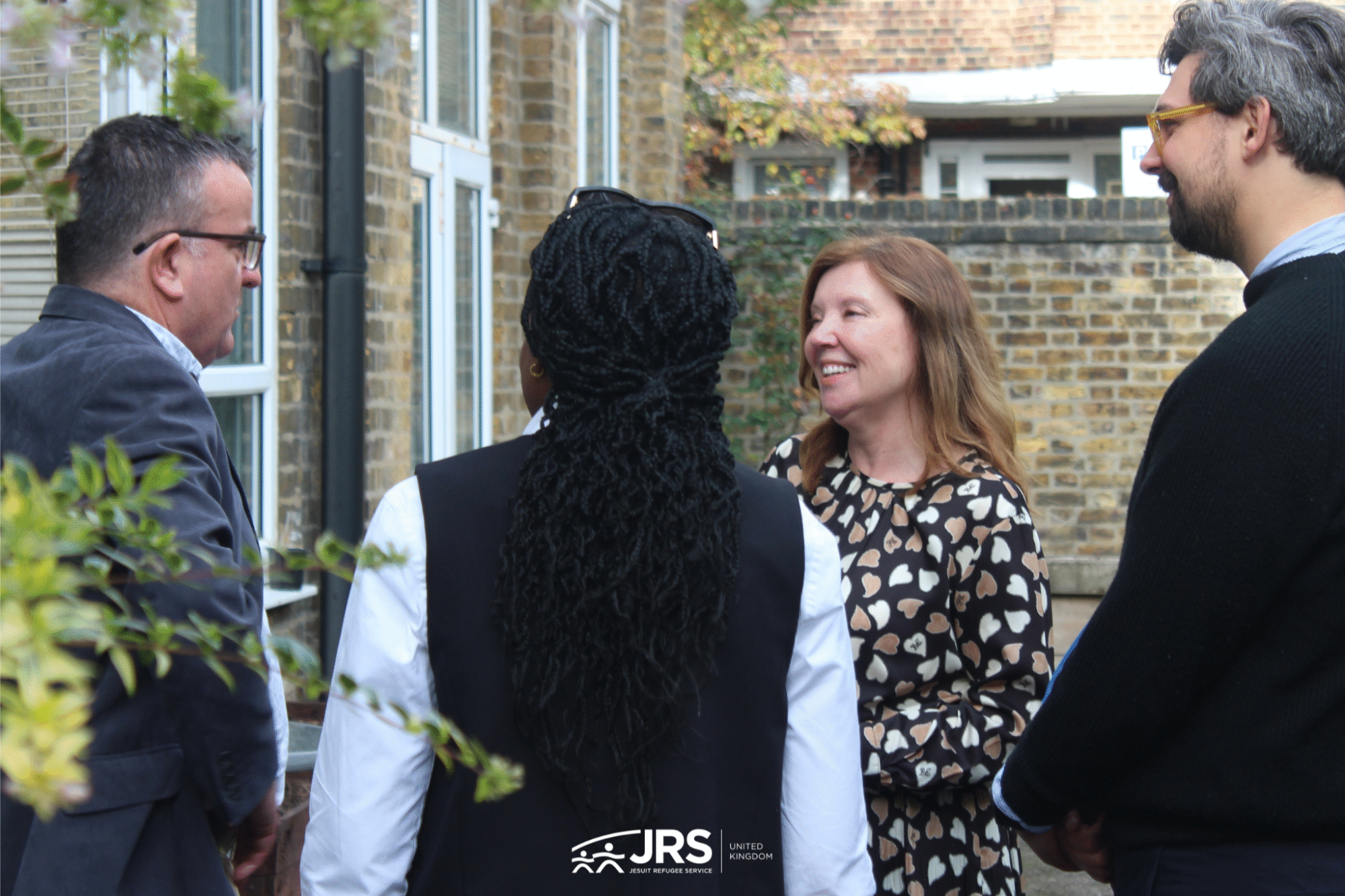 Children's Commissioner talking to people in the JRS garden
